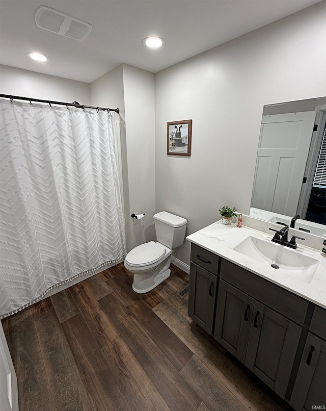9 Deerfield Ln, Washington, IN 47501 - bathroom with toilet, wood finished floors, vanity, recessed lighting, and curtained shower