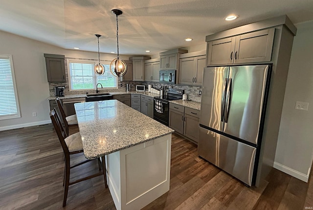 9 Deerfield Ln, Washington, IN 47501 - kitchen featuring appliances with stainless steel finishes, gray cabinets, a sink, backsplash, and dark wood-style floors