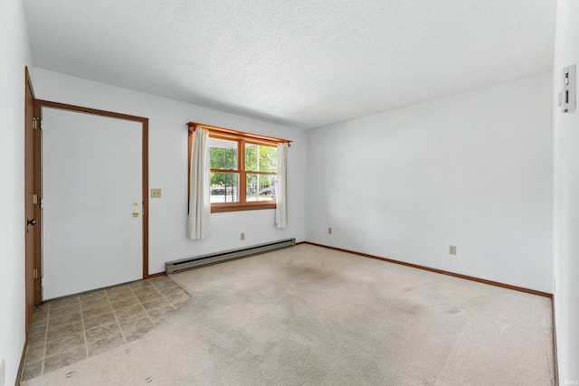 301 W Jefferson St, Columbia City, IN 46725 - unfurnished room with a baseboard radiator, carpet flooring, and a textured ceiling