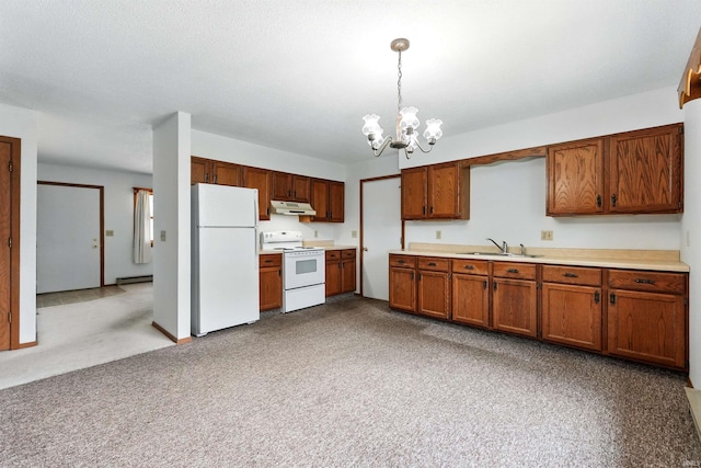 301 W Jefferson St, Columbia City, IN 46725 - kitchen featuring white appliances, under cabinet range hood, a chandelier, baseboard heating, and light countertops