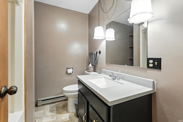 301 W Jefferson St, Columbia City, IN 46725 - bathroom with a baseboard radiator, vanity, toilet, and baseboards