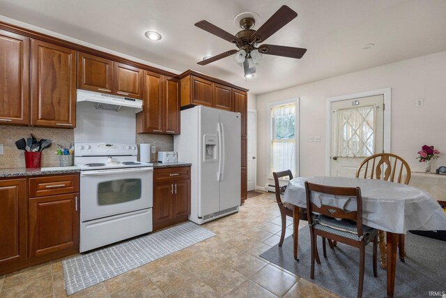 405 Miner Rd, Avilla, IN 46710 - kitchen featuring white appliances, under cabinet range hood, a ceiling fan, backsplash, and brown cabinets