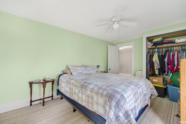 405 Miner Rd, Avilla, IN 46710 - carpeted bedroom with a closet, a ceiling fan, and baseboards
