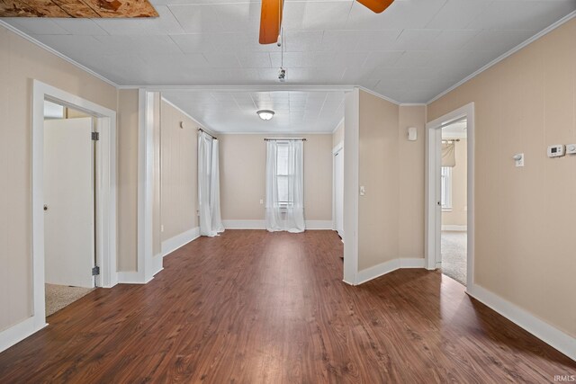 1804 Maple St, Lafayette, IN 47904 - spare room with ceiling fan, dark wood-style flooring, crown molding, and baseboards