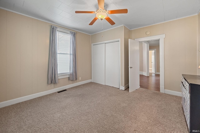1804 Maple St, Lafayette, IN 47904 - unfurnished bedroom featuring crown molding, carpet floors, a closet, and a ceiling fan