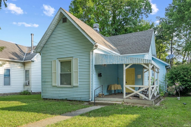 1804 Maple St, Lafayette, IN 47904 - view of front of home with a front lawn and a shingled roof