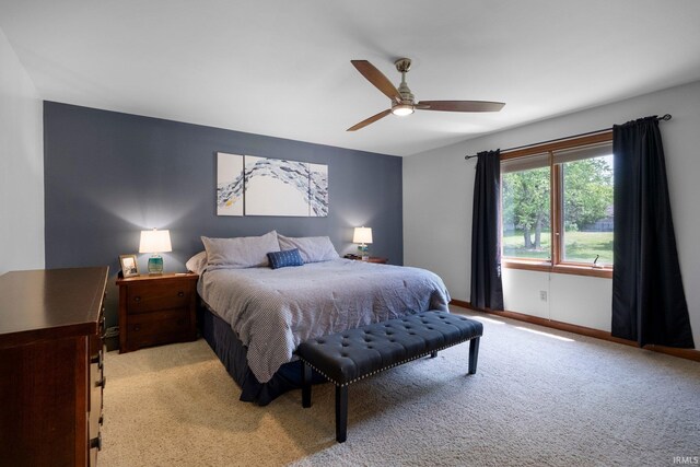 6811 Bittersweet Dells Ct, Fort Wayne, IN 46814 - bedroom featuring light carpet, baseboards, and a ceiling fan