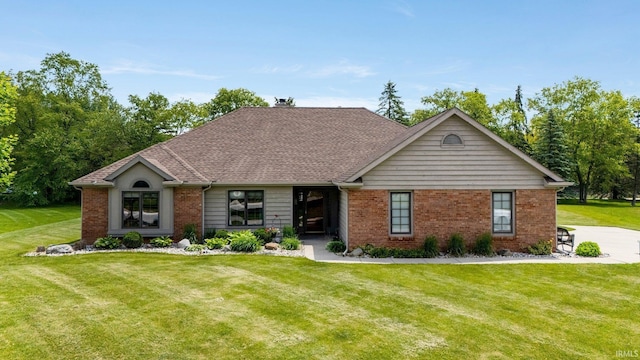 6811 Bittersweet Dells Ct, Fort Wayne, IN 46814 - view of front of property featuring a front lawn, brick siding, a shingled roof, and a chimney