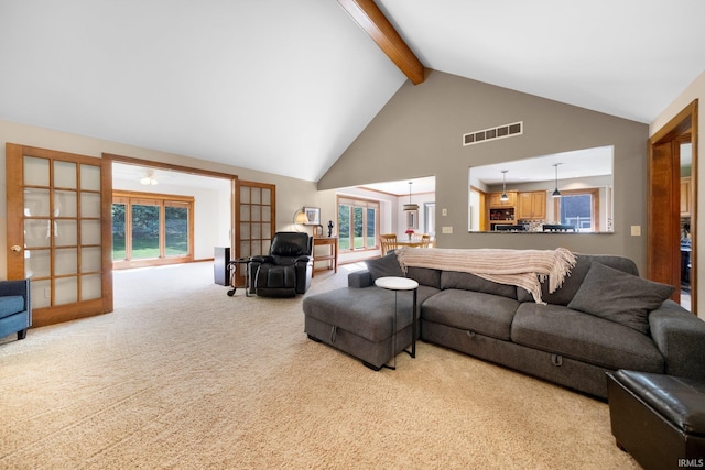 6811 Bittersweet Dells Ct, Fort Wayne, IN 46814 - living room with high vaulted ceiling, beamed ceiling, and carpet flooring