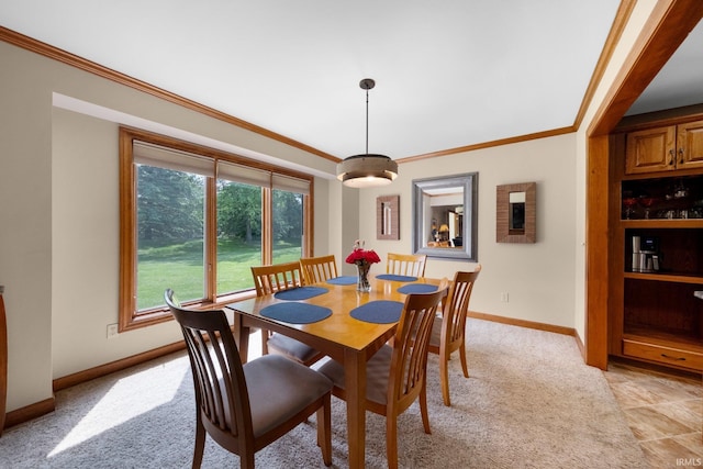 6811 Bittersweet Dells Ct, Fort Wayne, IN 46814 - dining area with crown molding, baseboards, and light colored carpet