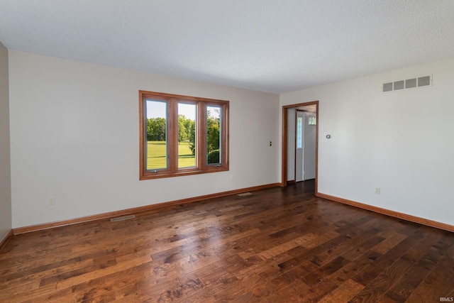 4431 Mccomb Rd, Huntertown, IN 46748 - spare room with dark wood-type flooring and baseboards