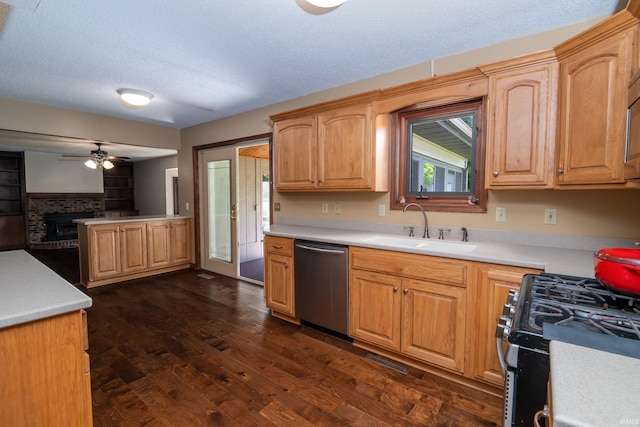 4431 Mccomb Rd, Huntertown, IN 46748 - kitchen with stainless steel appliances, a sink, ceiling fan, dark wood-type flooring, and open floor plan