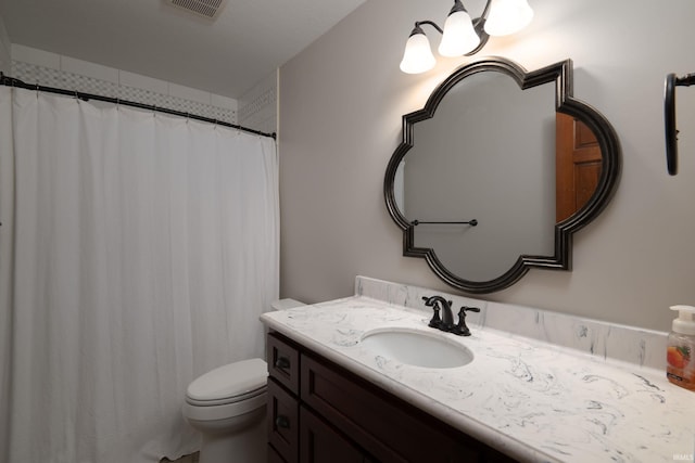 4431 Mccomb Rd, Huntertown, IN 46748 - full bathroom featuring vanity, toilet, and a shower with shower curtain