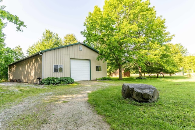 4431 Mccomb Rd, Huntertown, IN 46748 - detached garage featuring dirt driveway