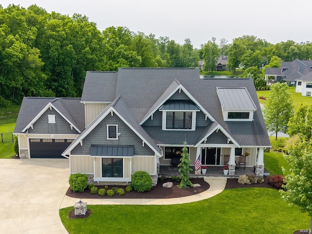 119 Artisan Pass, Fort Wayne, IN 46845 - craftsman-style home featuring board and batten siding, covered porch, driveway, and a front lawn