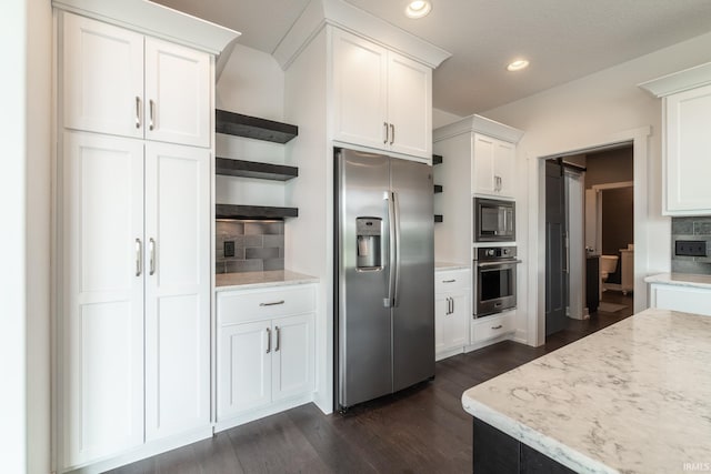 119 Artisan Pass, Fort Wayne, IN 46845 - kitchen featuring appliances with stainless steel finishes, open shelves, backsplash, white cabinets, and dark wood-type flooring