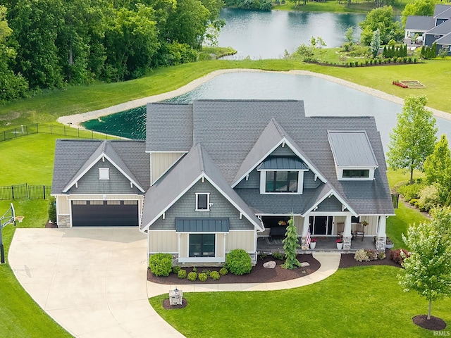 119 Artisan Pass, Fort Wayne, IN 46845 - craftsman house featuring board and batten siding, driveway, a water view, a garage, and a porch