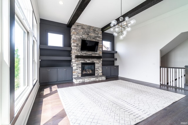 119 Artisan Pass, Fort Wayne, IN 46845 - living room with healthy amount of natural light, beamed ceiling, dark wood-style flooring, a chandelier, and a fireplace