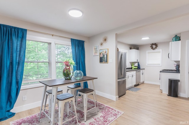 1409 Miner St, South Bend, IN 46617 - dining space featuring light wood finished floors and baseboards