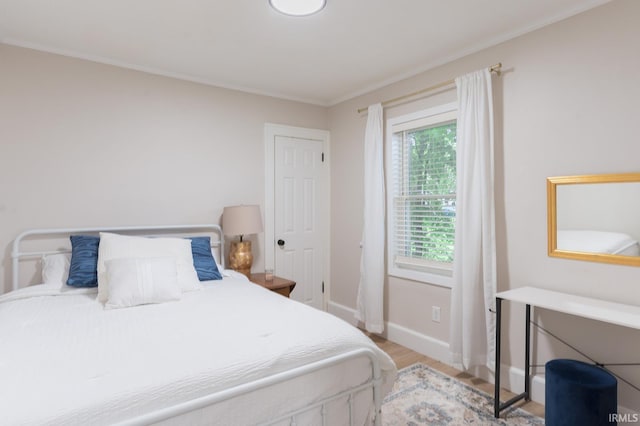 1409 Miner St, South Bend, IN 46617 - bedroom featuring light wood-style floors and baseboards
