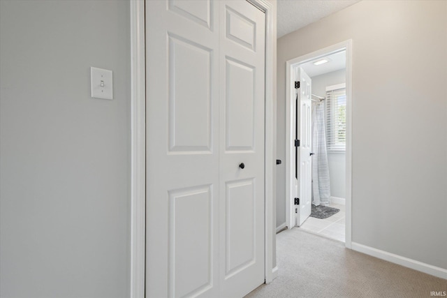 12678 Pat Ln, Granger, IN 46530 - corridor with light carpet and baseboards