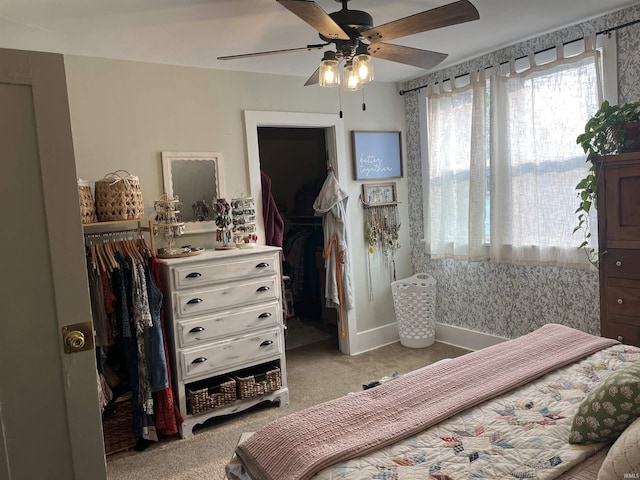 617 S Main St, Goshen, IN 46526 - bedroom with carpet flooring, baseboards, ceiling fan, and a closet