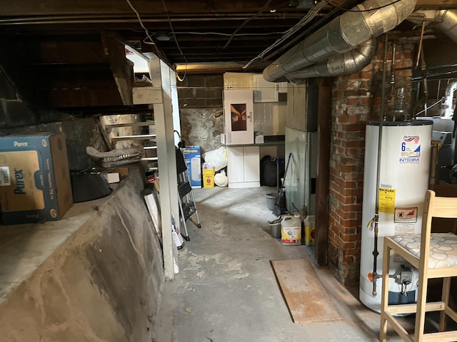 617 S Main St, Goshen, IN 46526 - unfinished below grade area with gas water heater