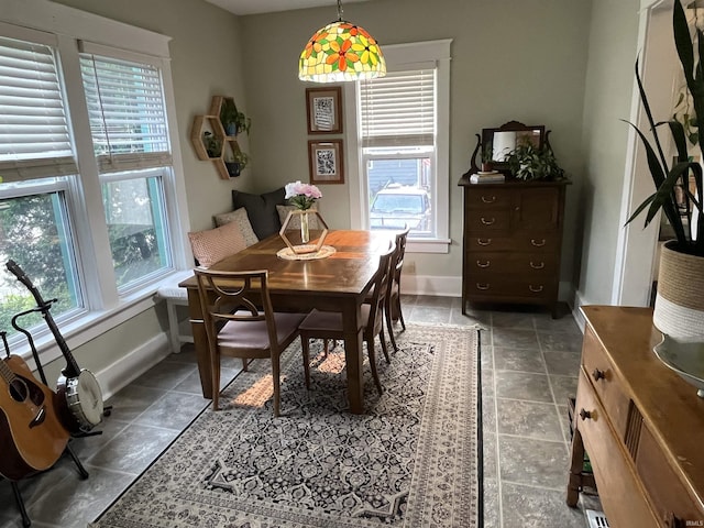 617 S Main St, Goshen, IN 46526 - dining room featuring baseboards and healthy amount of natural light