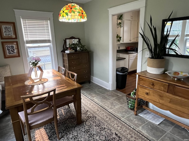 617 S Main St, Goshen, IN 46526 - dining room featuring baseboards