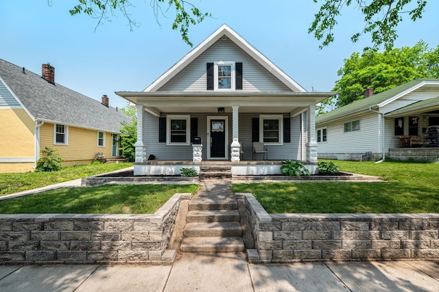 1706 Pierce St, Lafayette, IN 47905 - view of front of home featuring covered porch and a front yard