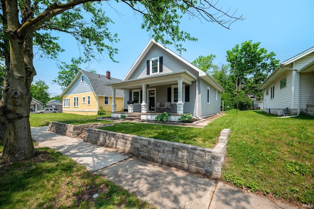 1706 Pierce St, Lafayette, IN 47905 - view of front of home featuring a porch and a front lawn