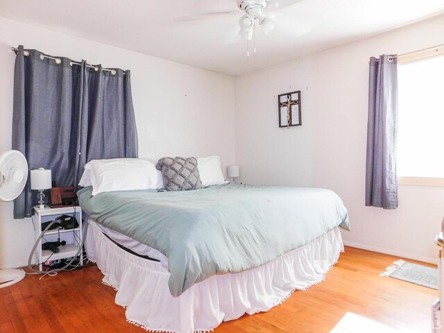 2363 N Oak Dr, Bluffton, IN 46714 - bedroom with wood finished floors and a ceiling fan