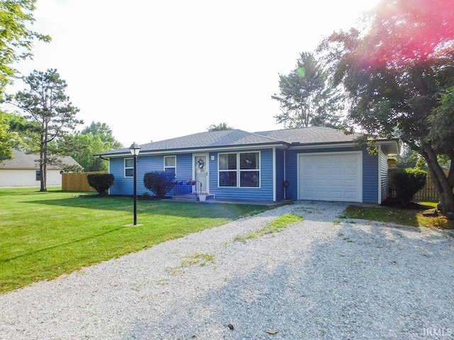 2363 N Oak Dr, Bluffton, IN 46714 - single story home with an attached garage and gravel driveway