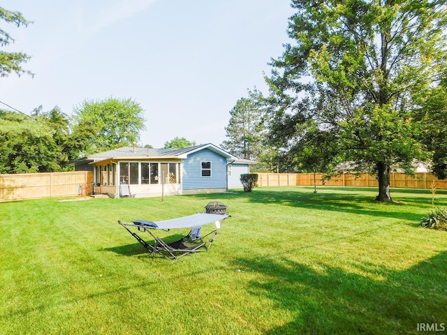 2363 N Oak Dr, Bluffton, IN 46714 - fenced backyard featuring a sunroom