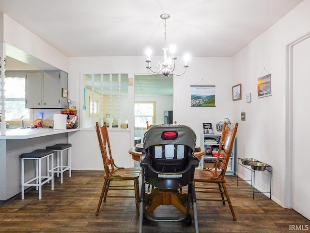2363 N Oak Dr, Bluffton, IN 46714 - dining area with a chandelier and dark wood-style flooring