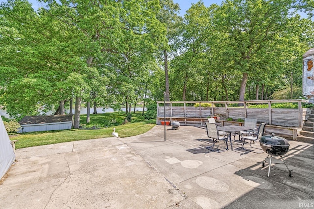 22907 State Road 120, Elkhart, IN 46516 - view of patio / terrace featuring view of wooded area, area for grilling, and outdoor dining space