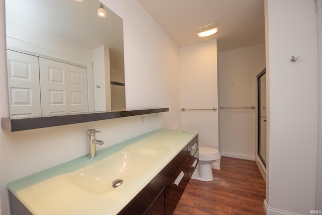 12071 W Tecumseh Bend Rd, Brookston, IN 47923 - full bath featuring vanity, toilet, wood finished floors, and an enclosed shower