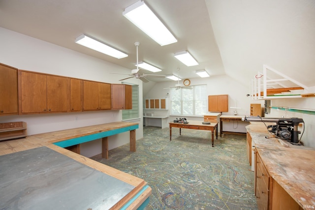 12071 W Tecumseh Bend Rd, Brookston, IN 47923 - rec room with lofted ceiling, a workshop area, and a ceiling fan