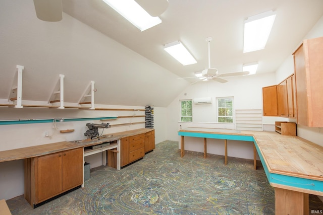 12071 W Tecumseh Bend Rd, Brookston, IN 47923 - office space with a wall unit AC, ceiling fan, lofted ceiling, and a workshop area