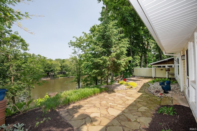 12071 W Tecumseh Bend Rd, Brookston, IN 47923 - view of patio / terrace featuring a water view