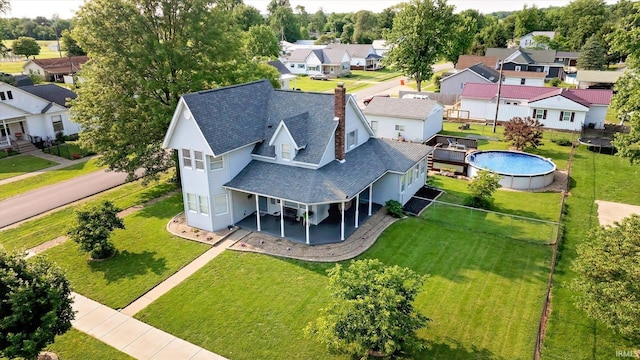 210 W Main St, Worthington, IN 47471 - aerial view of residential area with a pool area
