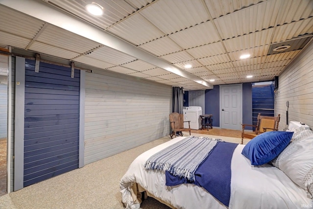 210 W Main St, Worthington, IN 47471 - bedroom featuring independent washer and dryer, carpet flooring, wooden walls, and recessed lighting