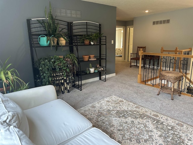 8284 S Mackenzie Ct, Bloomington, IN 47401 - living room with carpet floors and baseboards