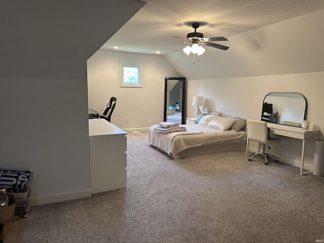 8284 S Mackenzie Ct, Bloomington, IN 47401 - carpeted bedroom featuring vaulted ceiling, an office area, baseboards, and ceiling fan