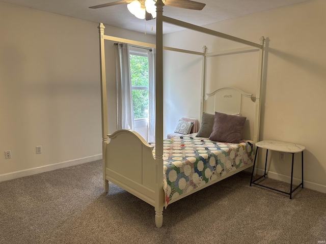 8284 S Mackenzie Ct, Bloomington, IN 47401 - bedroom with carpet flooring, baseboards, and a ceiling fan