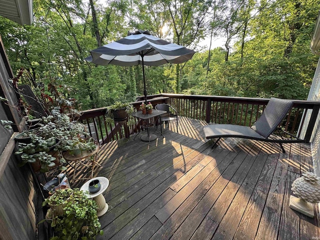 8284 S Mackenzie Ct, Bloomington, IN 47401 - wooden deck with outdoor dining area