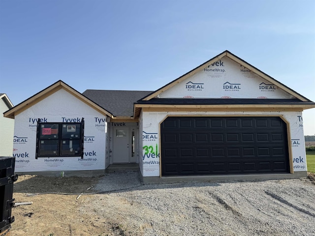 2593 Hogans Aly, Decatur, IN 46733 - property under construction with driveway, a garage, and a shingled roof