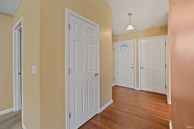 1890 Cal Dr, West Lafayette, IN 47906 - foyer featuring baseboards and dark wood finished floors