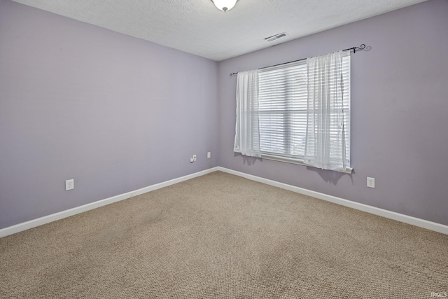 1890 Cal Dr, West Lafayette, IN 47906 - carpeted spare room featuring baseboards and a textured ceiling