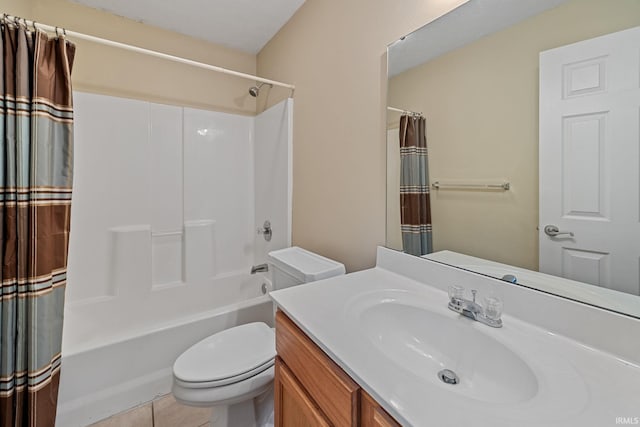 1890 Cal Dr, West Lafayette, IN 47906 - full bathroom featuring vanity, toilet, shower / tub combo, and tile patterned flooring